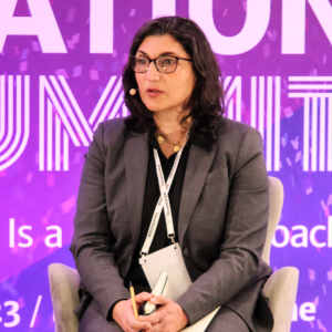 Elham Tabassi speaking at the International AI Summit 2023